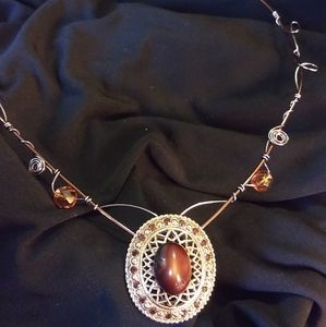 Repurposed charm into new Copper Twisted necklace